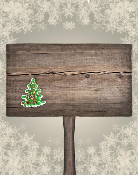 Christmas green fir tree on a wooden board. New Year background — Stock Photo, Image