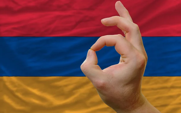 OK gebaar voor Armenië nationale vlag — Stockfoto