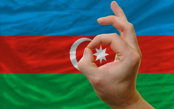 Ok gesture in front of azerbaijan national flag — Stock Photo, Image