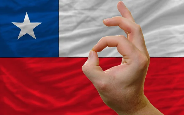 Ok gesture in front of chile national flag — Stock Photo, Image