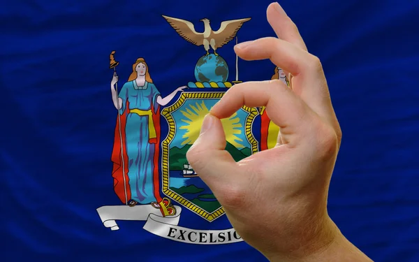 Ok gesture in front of new york us state flag — Stock Photo, Image