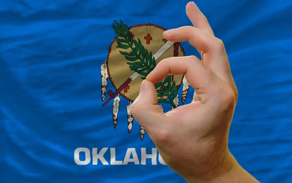 Ok gesture in front of oklahoma us state flag — Stock Photo, Image