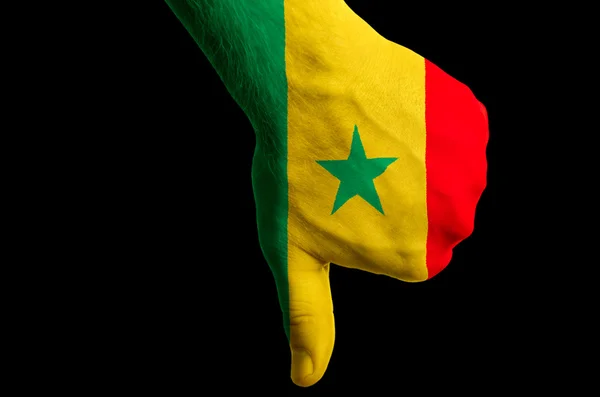 Senegalesische Nationalflagge zeigt Daumen nach unten Geste für Versagen gemacht mit — Stockfoto