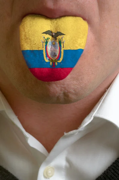 Man tongue painted in ecuador flag symbolizing to knowledge to s — Stock Photo, Image