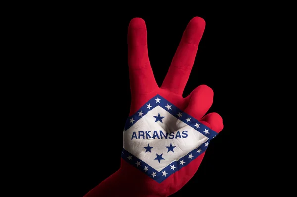 Arkansas us state flag two finger up gesture for victory and win — Stock Photo, Image