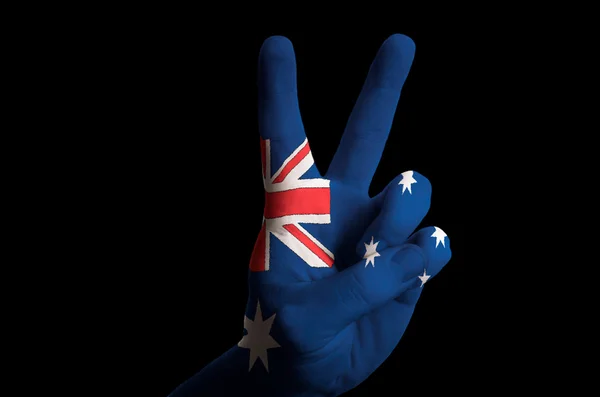 Australië nationale vlag twee vinger omhoog gebaar voor overwinning en draadloos — Stockfoto