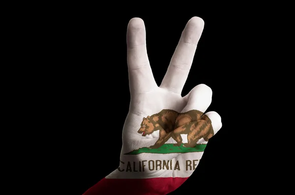 加州我们国家国旗两个手指放在为胜利和 w 的姿态 — 图库照片