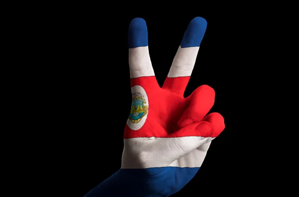 Costarica national flag two finger up gesture for victory and wi — Stock Photo, Image