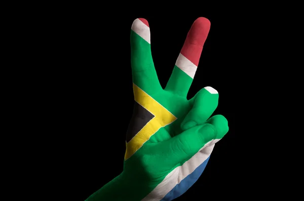 South africa national flag two finger up gesture for victory and — Stock Photo, Image