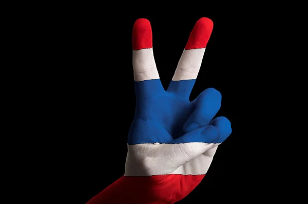 Thailändische Nationalflagge mit zwei erhobenen Fingern für Sieg und Niederlage — Stockfoto