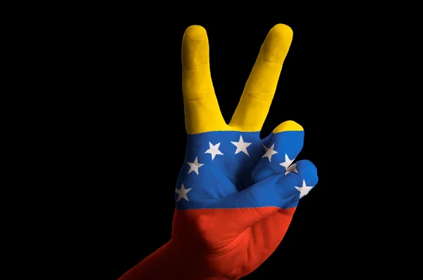 Venezuela national flag two finger up gesture for victory and wi — Stock Photo, Image