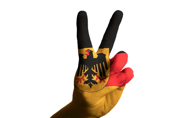 Germany national flag two finger up gesture for victory and winn — Stock Photo, Image