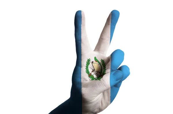 Guatemala national flag two finger up gesture for victory and wi — Stock Photo, Image