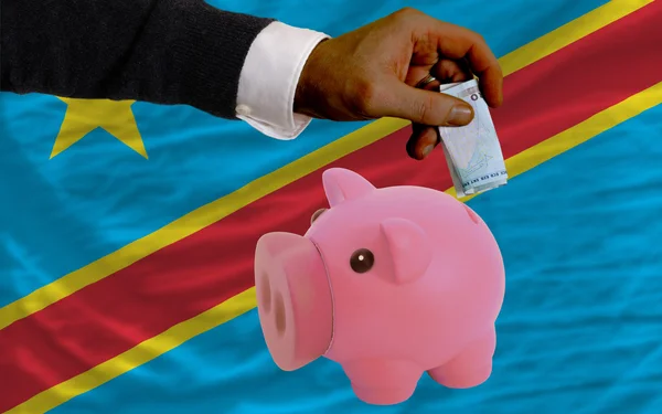 Finansowanie euro bogaty piggy bank Narodowy Flaga Konga — Zdjęcie stockowe