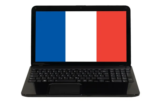 Computador portátil com bandeira nacional da frança — Fotografia de Stock