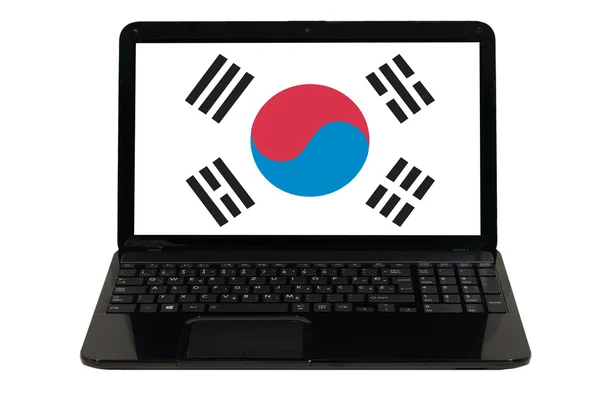 韓国の国旗を持つラップトップ コンピューター — ストック写真