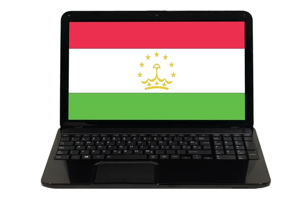 Computer portatile con bandiera nazionale del tajikistan — Foto Stock