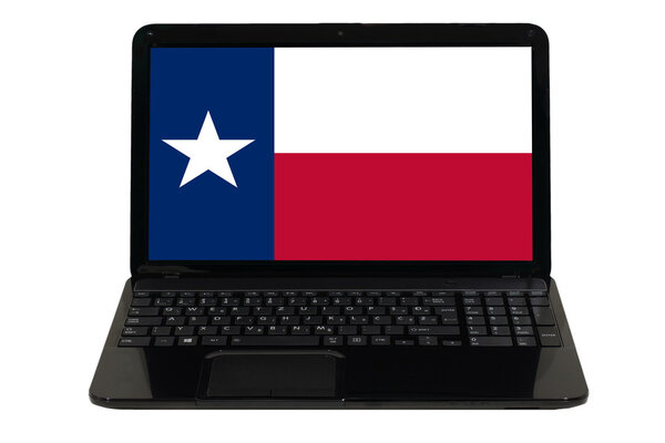 laptop computer with flag of american state of texas
