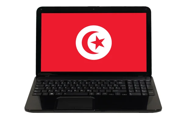 Přenosný počítač s národní vlajkou Tuniska — Stock fotografie