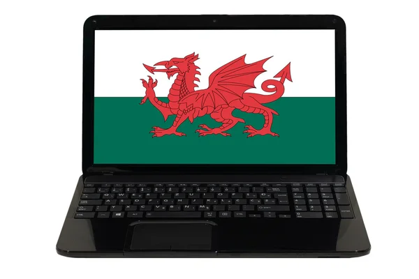 Bärbar dator med nationella flagga wales — Stockfoto