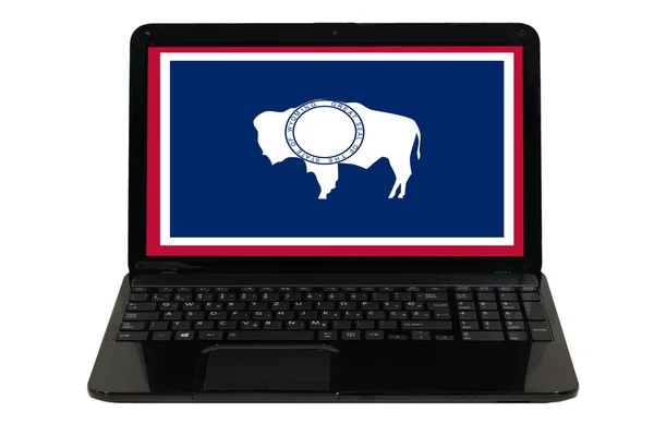 Computador portátil com bandeira do estado americano de wyoming — Fotografia de Stock