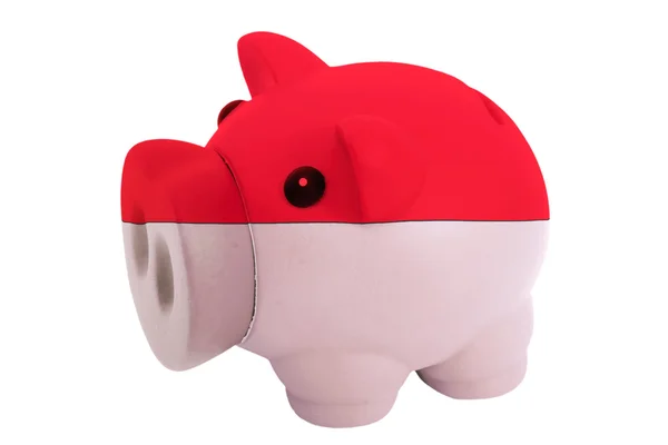 Piggy rich bank in colors national flag of indonesia for sav — Stock Photo, Image