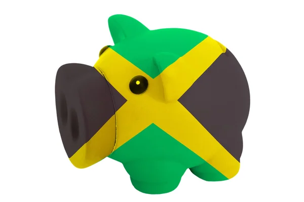 Piggy rich bank in colors national flag of jamaica for savin — Stock Photo, Image