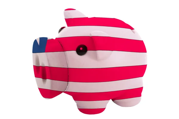 Piggy rich bank in colors national flag of liberia for savin — Stock Photo, Image