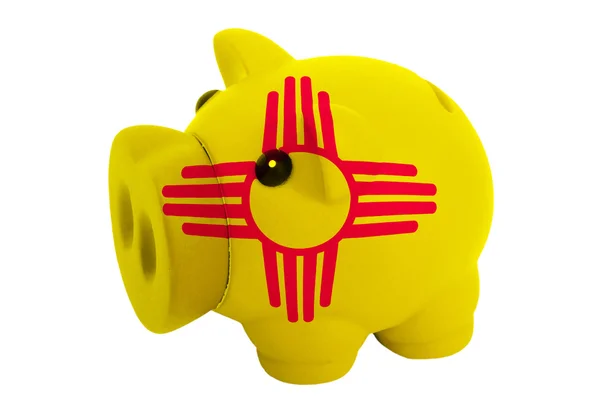 Piggy rich bank in colors flag of american state of new mexico — Stock Photo, Image