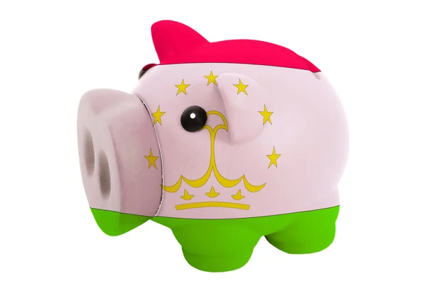 Piggy rich bank in colors national flag of tajikistan for sa — Stock Photo, Image