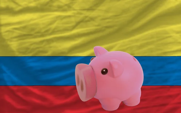 Zengin Piggy banka ve columbia bayrağı — Stok fotoğraf