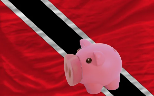 Rika piggy bank och nationella flagga trinidad tobago — Stockfoto