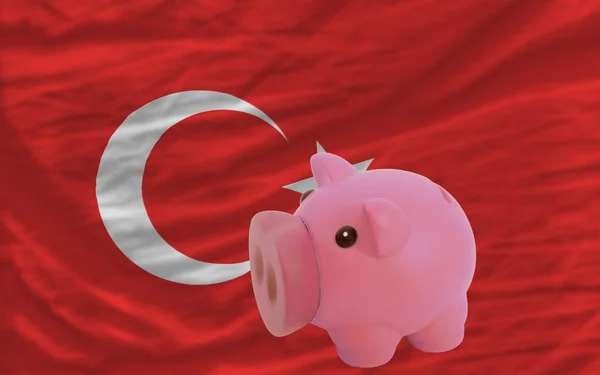 Piggy rich bank and national flag of turkey — Stock Photo, Image