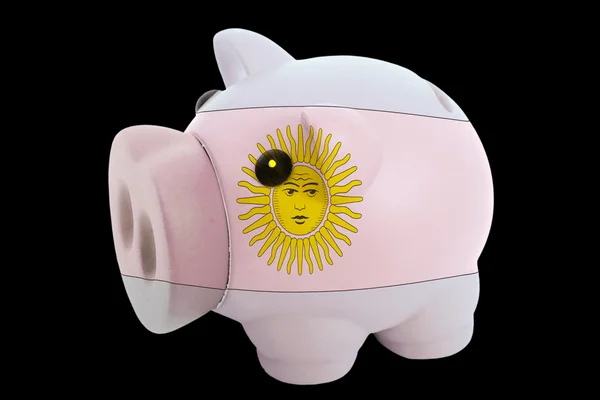 Piggy rijke bank in kleuren nationale vlag van Argentinië voor savin — Stockfoto