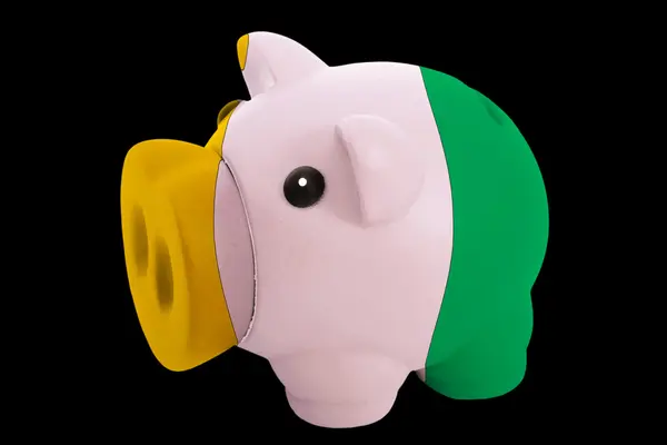 Piggy rich bank in colors national flag of cote ivore for savi — Stock Photo, Image