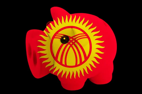 Piggy bank bogata w kolory flagi narodowej Kirgizji sav — Zdjęcie stockowe