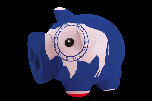 Piggy rich bank in colors flag of american state of wyoming fo — Stock Photo, Image