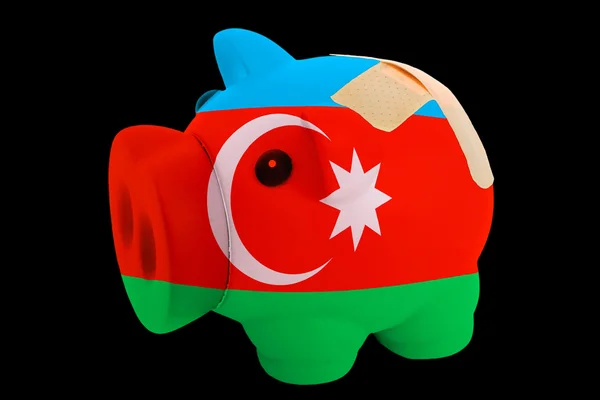 Failliete piggy rijke bank in de kleuren van de nationale vlag van azerbaija — Stockfoto