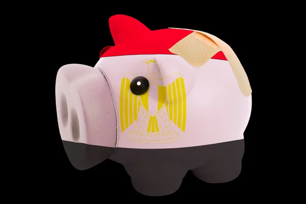 Bankrupt piggy rich bank in colors of national flag of egypt — Stock Photo, Image