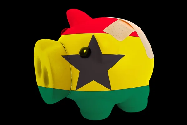 Upadłości piggy bank bogata w kolory flagi narodowej z Ghany — Zdjęcie stockowe