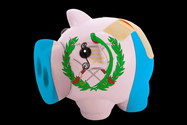 Bankrupt piggy rich bank in colors of national flag of guatemala — Stock Photo, Image
