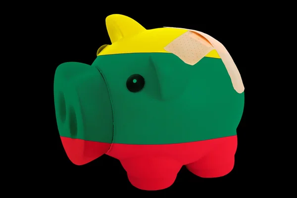 Bankrupt piggy rich bank in colors of national flag of lithuania — Stock Photo, Image