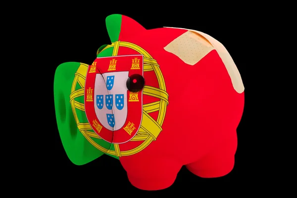 Bankrupt piggy rich bank in colors of national flag of portugal — Stock Photo, Image