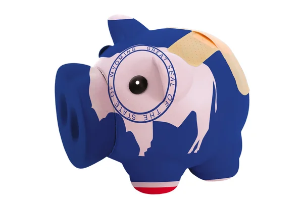 Gesloten piggy rijke bank met pleister in kleuren vlag van Amerikaans s — Stockfoto