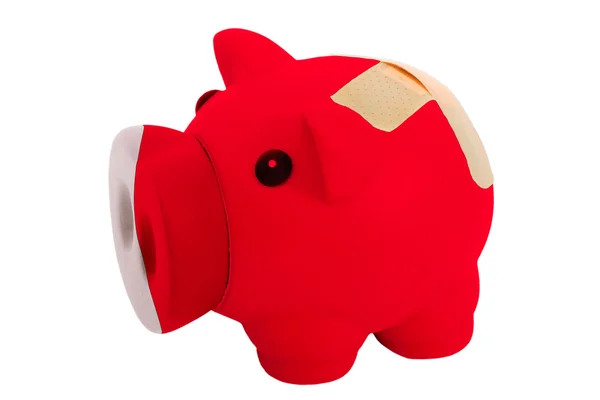 Closed piggy rich bank with bandage in colors national flag of b — Stock Photo, Image