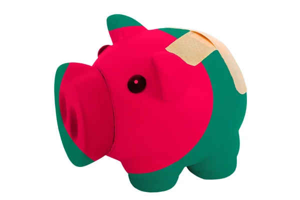 Sparschwein reich mit Binde in den Farben der Nationalflagge von b — Stockfoto