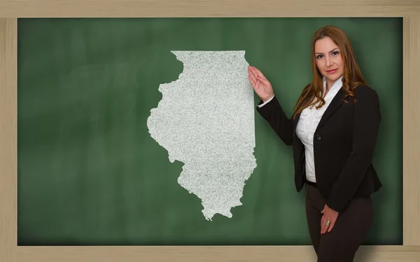 Вчитель, що показує карту Іллінойсу на дошці — стокове фото