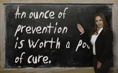 Teacher showing An ounce of prevention is worth a pound of cure2 clipart