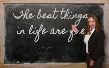 Hayattaki en iyi şeyler gösterilen öğretmen tahtaya ücretsiz