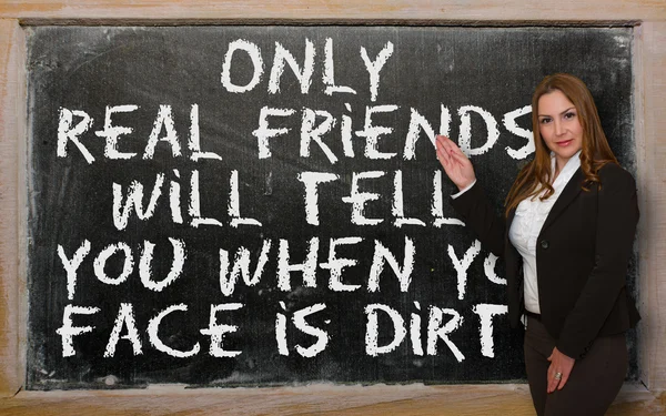 Teacher showing Only real friends will tell you when your face — Stock Photo, Image